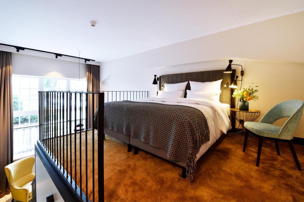 Das James Flensburg Kültér fotó A bedroom at the hotel